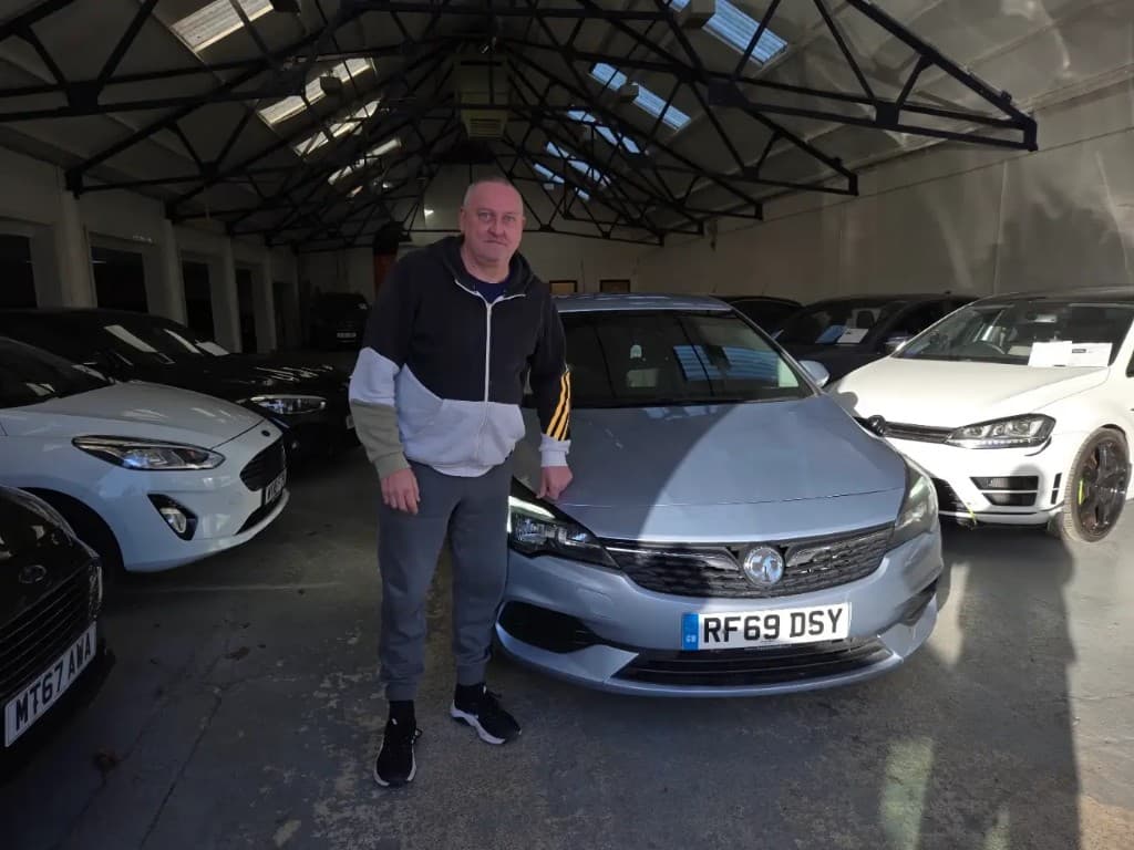 Customer collecting their Vauxhall Astra