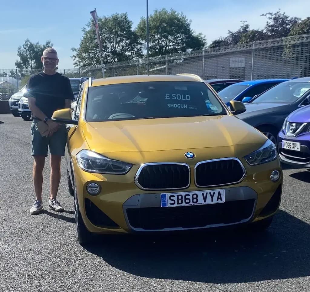 Customer collecting their BMW X2