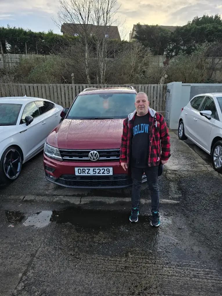 Customer with their Volkswagen Tiguan